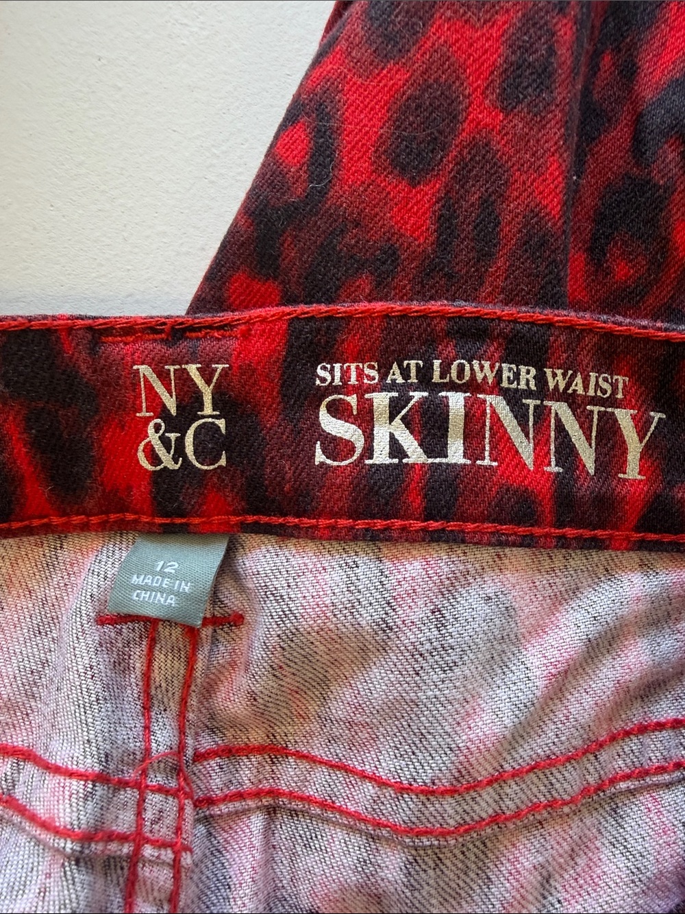 Woman’s New York & Company Red and Black Leopard Skinny Jeans, Size 12 - Picture 3 of 3